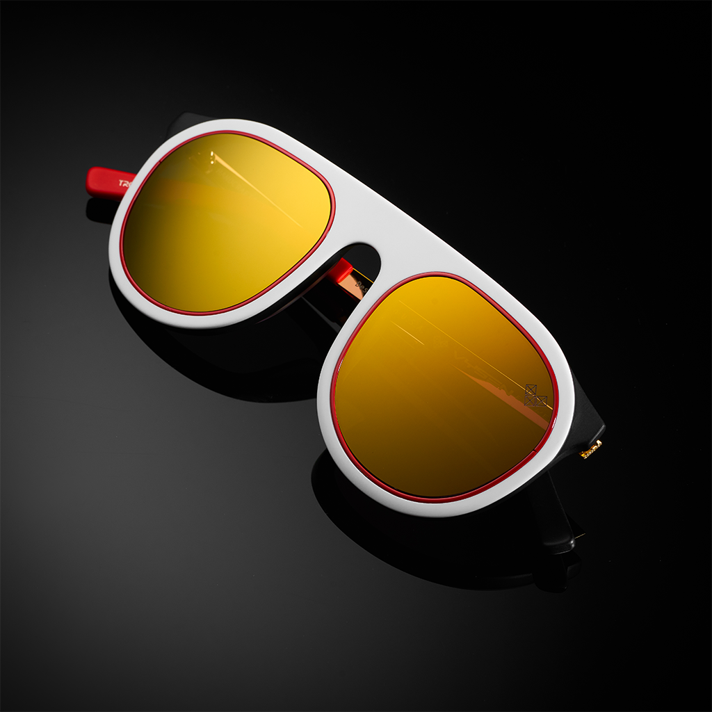 TROY ARMAZON BLANCO LENTES DORADOS